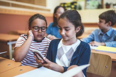 Children who travel to and from school alone are often given phones, but there's always the danger that they'll be a distraction or source of envy. Getty