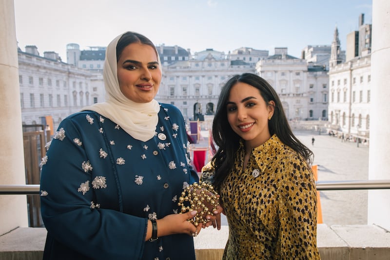 Abu Dhabi pavilion design team Salama Al Shamsi, left, and Azza Alsharif accept the award in London. Photo: Iona Wolff