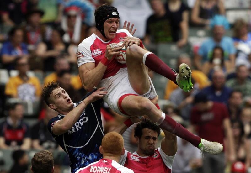 Tom Powell, centre, and his England teammates will focus on raising their game today. Bobby Yip / Reuters