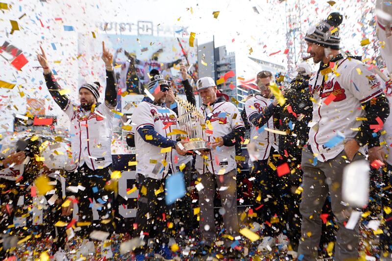 Atlanta Braves manager Brian Snitker holds the Commissioner's Trophy during a celebration at Truist Park on November 5, 2021, in Atlanta, Georgia. EPA