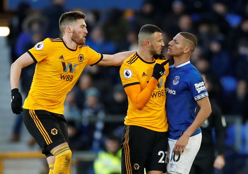 Soccer Football - Premier League - Everton v Wolverhampton Wanderers - Goodison Park, Liverpool, Britain - February 2, 2019  Everton's Richarlison clashes with Wolverhampton Wanderers' Romain Saiss   Action Images via Reuters/Carl Recine  EDITORIAL USE ONLY. No use with unauthorized audio, video, data, fixture lists, club/league logos or "live" services. Online in-match use limited to 75 images, no video emulation. No use in betting, games or single club/league/player publications.  Please contact your account representative for further details.