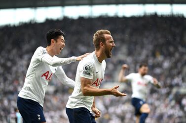 LONDON, ENGLAND - MAY 15:  Harry Kane of Tottenham Hotspur celebrates with team mate Heung-Min Son after scoring during the Premier League match between Tottenham Hotspur and Burnley at Tottenham Hotspur Stadium on May 15, 2022 in London, England. (Photo by Shaun Botterill / Getty Images)