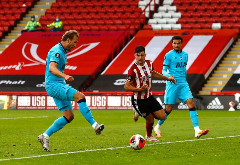 Spurs striker Harry Kane makes the score 3-1. Getty