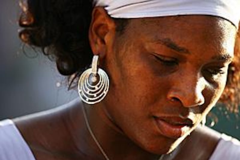 Serena Williams looks pensive during her unconvincing win over Zheng Jie at the Sony Ericsson Open.