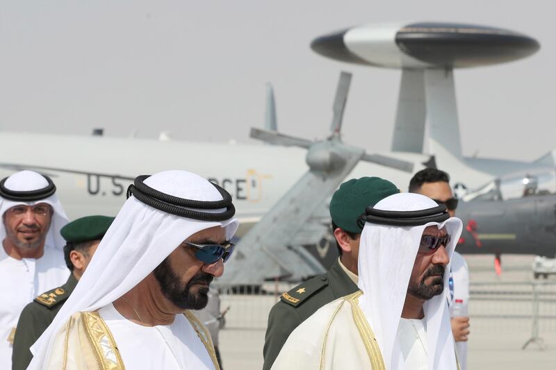 Vice President and Ruler of Dubai, Sheikh Mohammed bin Rashid, left, attends the Dubai Airshow on November 12, 2017. Karim Sahib / AFP