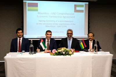 Dr Thani Al Zeyoudi and Maneesh Gobin (second from right), Minister of Foreign Affairs, Regional Integration and International trade of Mauritius, finalised the terms of a Cepa deal in Mauritius. Courtesy: Dubai Media Office