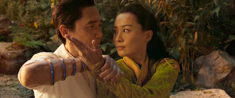 Tony Leung, left, and Fala Chen in a scene from 'Shang-Chi and the Legend of the Ten Rings', nominated for Best Visual Effects. Marvel Studios via AP