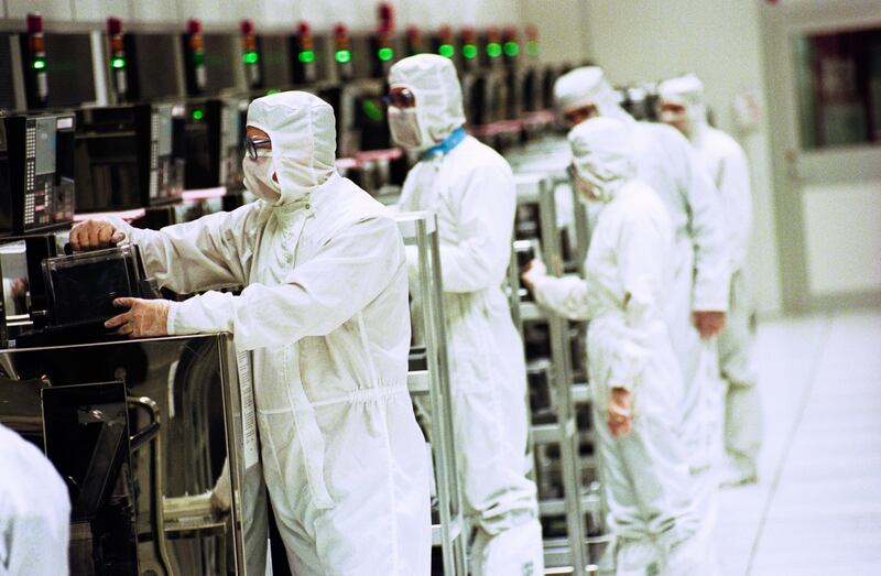 Workers at a semiconductor factory in south Wales. Alamy