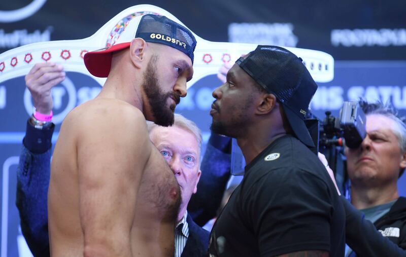 British Boxers Tyson Fury (L) and Dillian Whyte (R) pose during the Weigh In for the Fury v Whyte fight at Wembley Box Park in London, Britain, 22 April 2022.  Tyson Fury and Dillian Whyte fight on 23 April 2022 at Wembley Stadium for the WBC and The Ring heavyweight championship belts.   EPA / NEIL HALL