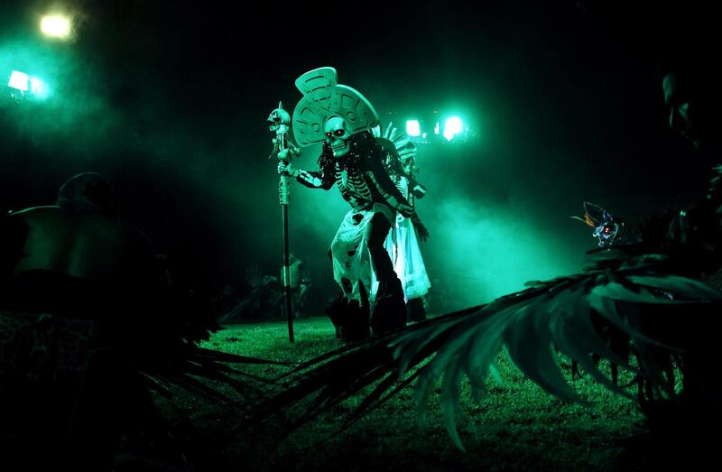 A person performs during the play 'La Llorona', based on one of the legends of pre-Hispanic Mexico, at the pier of Cuemanco in Xocimilco, Mexico City. Sashenka Gutirrez/EPA