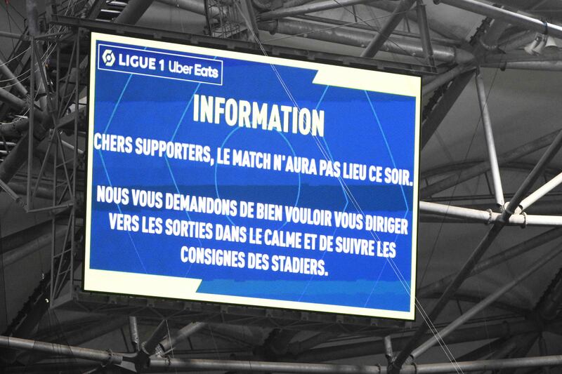 An information board announcing to supporters that the Ligue 1 encounter between Marseille and Lyon was postponed. AFP