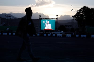 An image of Houthi leader Abdulmalik Al Houthi is projected on a screen in Sanaa as he delivers a speech after a UN-brokered truce expired. EPA