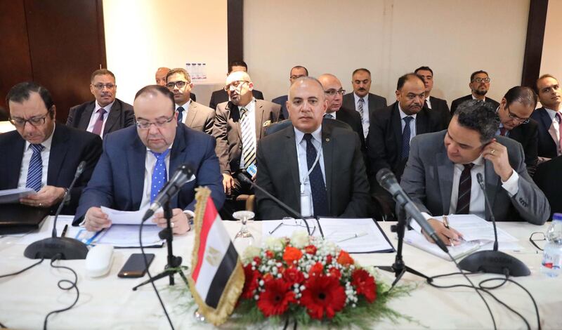 Egyptian Irrigation Minister Mohamed Abdel Aty, centre, attends a meeting with his Ethiopian and Sudanese counterparts, in Khartoum.  EPA