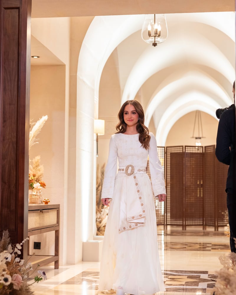 Princess Iman wore an embroidered white dress by Jordanian-Palestinian fashion designer Reema Dahbour
