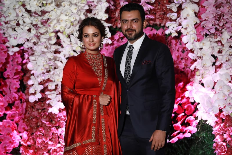 Dia Mirza (L) and her husband Sahil Sangha. Photo: EPA