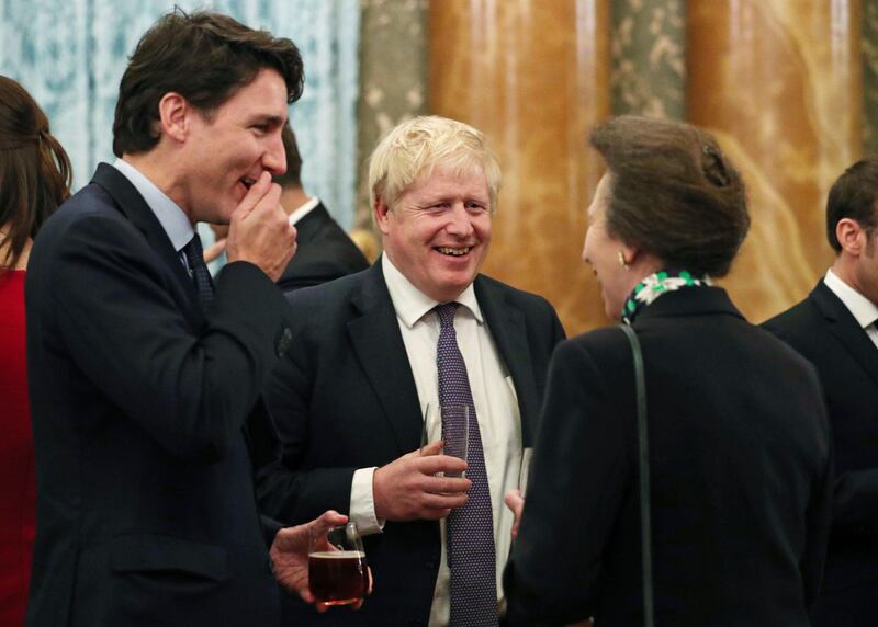 Britain's Princess Anne, right, talks to Nato delegates from left, Canadian Prime Minister Justin Trudeau and Britain's Prime Minister Boris Johnson. AP