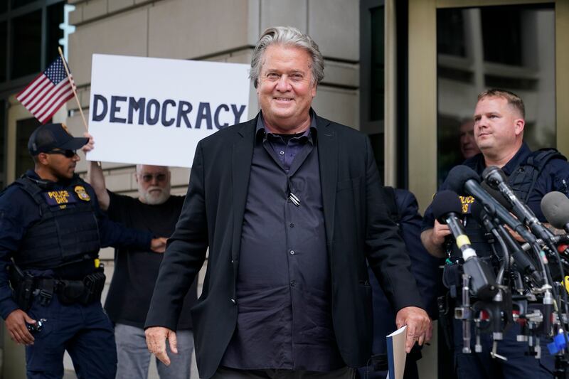 Former White House strategist Steve Bannon departs the federal courthouse, in Washington.  Jury selection began on Monday in the trial of Mr Bannon, a one-time adviser to former president Donald Trump. AP