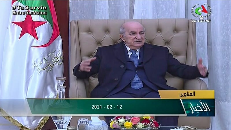 A video grab taken from footage broadcast by Algeria's "Canal Algerie 2" on February 12, 2021, shows President Abdelmadjid Tebboune meets with government officials upon his return to Algiers after a one-month stay in Germany for surgery following post-Covid-19 complications in his foot. Tebboune's prolonged stays abroad, totalling three months since late October, has raised criticism of the premier as the North African nation struggles to tackle health, political and economic crises. Tebboune, 75, had been hospitalised in Germany last year after contracting Covid-19, and stayed there for two months before returning to Algeria. - XGTY / BEST QUALITY AVAILABLE / XGTY / == RESTRICTED TO EDITORIAL USE - MANDATORY CREDIT "AFP PHOTO / HO / CANAL ALGERIE" - NO MARKETING NO ADVERTISING CAMPAIGNS - DISTRIBUTED AS A SERVICE TO CLIENTS ==
 / AFP / CANAL ALGERIE / - / XGTY / BEST QUALITY AVAILABLE / XGTY / == RESTRICTED TO EDITORIAL USE - MANDATORY CREDIT "AFP PHOTO / HO / CANAL ALGERIE" - NO MARKETING NO ADVERTISING CAMPAIGNS - DISTRIBUTED AS A SERVICE TO CLIENTS ==
