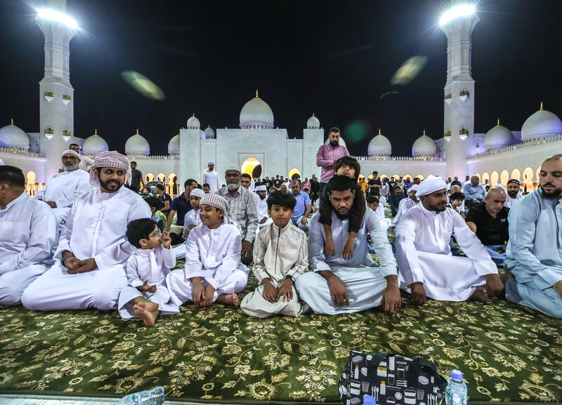 Worshippers attend prayers at the Sheikh Zayed Grand Mosque

