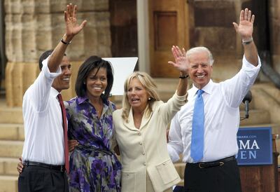 US Democratic presidential candidate Illinois Senator Barack Obama (L), his wife Michelle, running mate Delware Senator Joe Biden (R) with his wife Jill greet people gathered on the lawn of the Old State Capitol on August 23, 2008 in Springfield, Illinois. The Obama campaign confirmed this morning Biden had been selected as Obama's running mate.          AFP PHOTO/Scott Olson/Getty Images             FOR NEWSPAPERS, INTERNET, TELCOS AND TELEVISION USE ONLY
