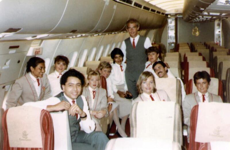 The crew on board an Emirates flight are all smiles. Emirates took delivery of its first bought aircraft, an Airbus 310 in 1987. The Airbus A310-300 was designed to Emirates specifications. Courtesy Emirates