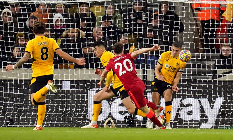 Conor Coady – 7. The boyhood Liverpool fan overcame a painful knock to put in a sterling display at the heart of the defence. His block on the line from Jota saved a certain goal. PA