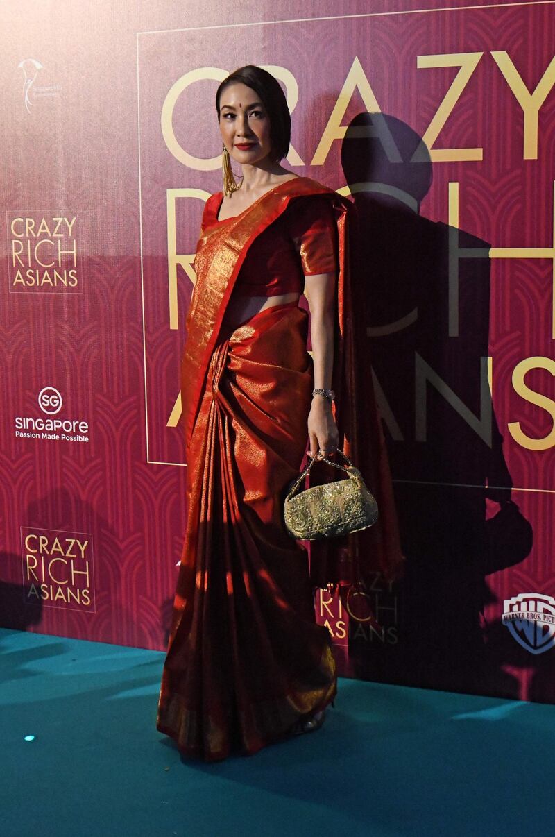 Singapore actress Amy Cheng posing at the premiere of the film 'Crazy Rich Asians' at the Capitol Theatre in Singapore. Roslan Rahman / AFP