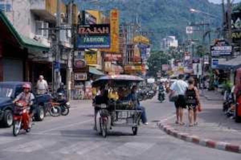 HI-RES: A bustling Patong town with tricycles and rickshaws,  It also contains an important centre of Phuket's nightlife and is the centre of cheap shopping on the island. (Travel Ink / Gallo Images)