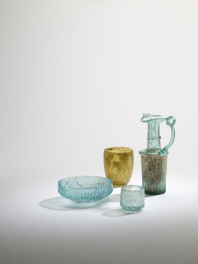 From left, Roman bowl, 50-70 AD; Roman beaker, first century AD; Byzantine cup, 500–700 AD; Byzantine jug, 400–500 AD. Photo: Archaeological Museum of the American University of Beirut, Lebanon