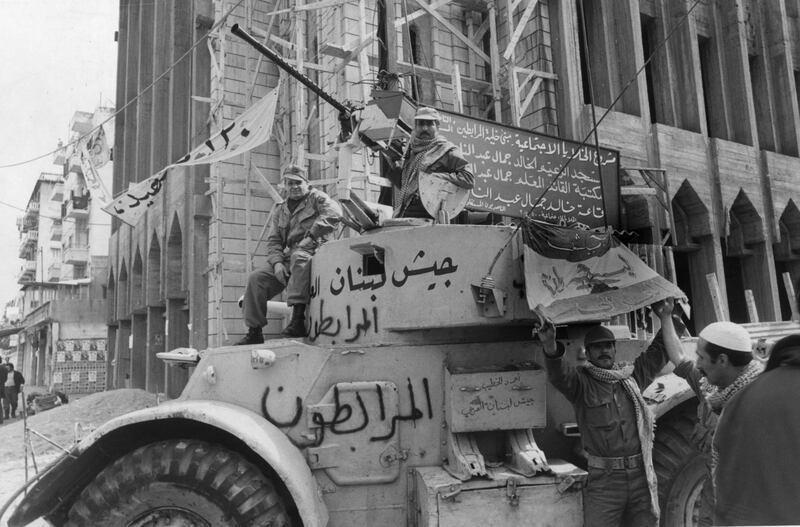 December 1975:  Guerrilla fighters on a tank in a street in Beirut during Lebanon's nine-month-old civil war, before peace discussions (reckoned to be the 23rd).  (Photo by Keystone/Getty Images)