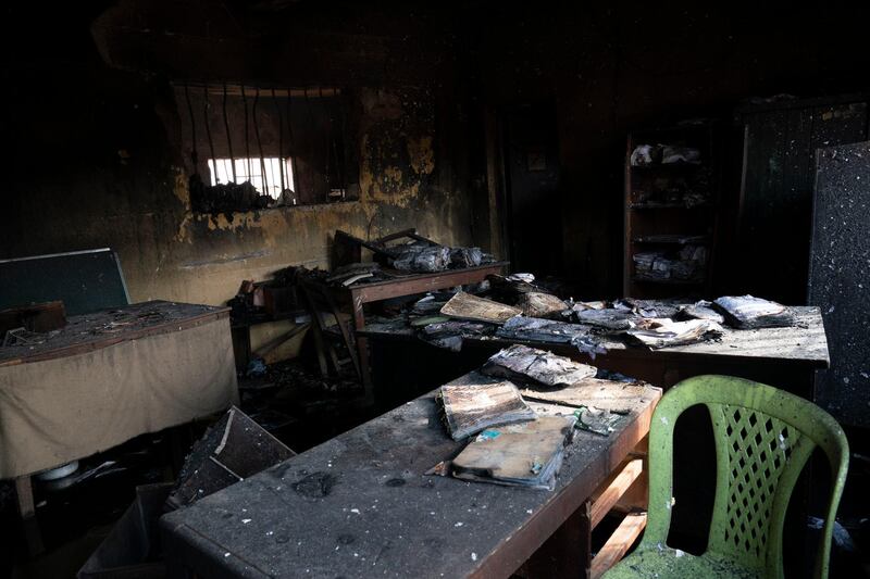 Burned documents are seen inside a correctional facility in Owerri, Nigeria. Hundreds of inmates escaped from the prison in southeastern Nigeria after a series of coordinated attacks, according to government officials. AP Photo