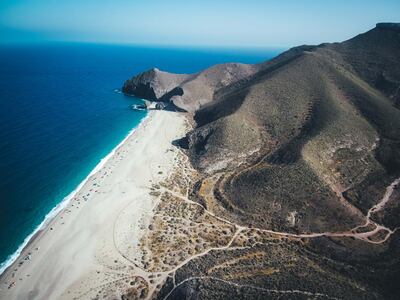 Aerial view of The beach of Los Muertos  on the coast of Almeria (Andalusia,Spain), located in the municipality of Carboneras in the Cabo de Gata-Níjar Natural Park. Aerial photography made with professional drone. Getty Images