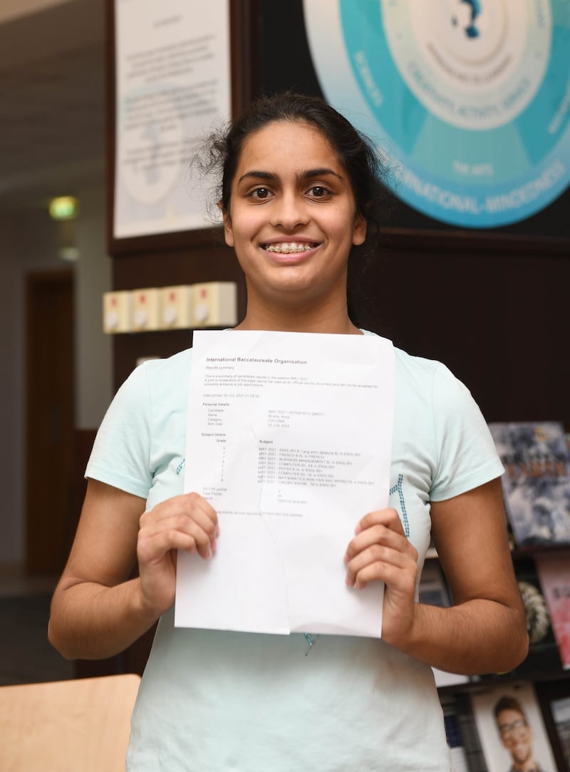Anya Bindra proudly shows the results of all her hard work.