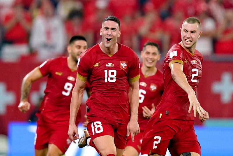 Dusan Vlahovic celebrates scoring Serbia's second goal. PA