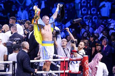 JEDDAH, SAUDI ARABIA - AUGUST 21: Oleksandr Usyk of Ukraine celebrates after beating Anthony Joshua of Great Britain in boxing rematch under the name of "Rage in the Red Sea" as he retains world title at King Abdullah Sports Complex in Jeddah, Saudi Arabia on August 22, 2022. (Photo by Ayman Yaqoob / Anadolu Agency via Getty Images)