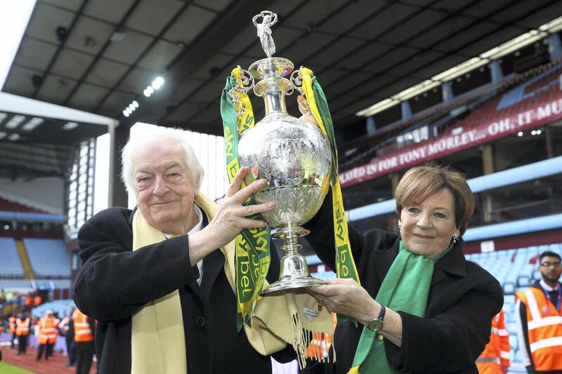 BIRMINGHAM, ENGLAND - MAY 05:  Delia Smith and husband Michael Wynn-Jones lift the championship trophy in celebration after the Sky Bet Championship match between Aston Villa and Norwich City at Villa Park on May 05, 2019 in Birmingham, England. (Photo by Matthew Lewis/Getty Images)