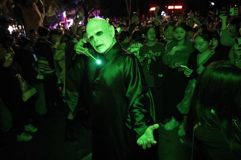 A street party attracted people dressed up for Halloween in Shanghai. AFP