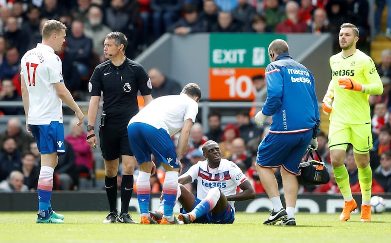 Stoke City's Bruno Martins Indi receives medical attention before being substituted off. Carl Recine / Reuters