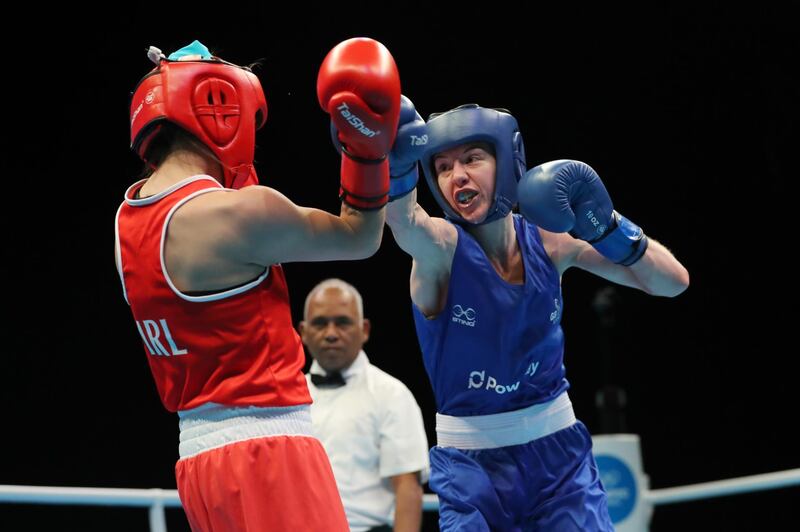 Britain's Charley-Sian Davison, right, on her way to victory over Irish fighter Carly McNaul in their flyweight bout at the Copper Box Arenain London. Getty