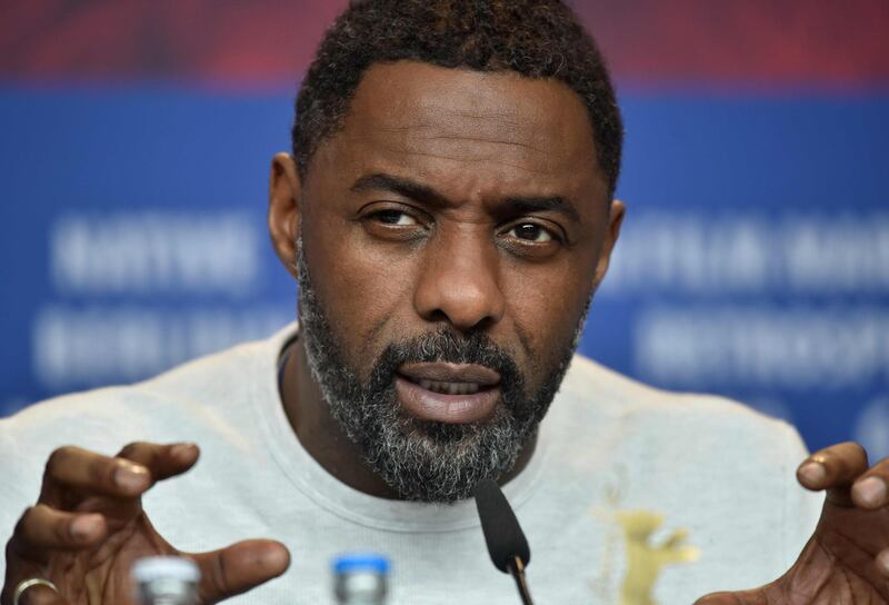 (FILES) In this file photo taken on February 22, 2018 British actor, director and executive producer Idris Elba speaks during a press conference to present the film "Yardie" shown in the "Panorama Special" category during the 68th edition of the Berlinale film festival in Berlin . - British actor Idris Elba fuelled speculation on August 12, 2018, that he may be named the first black man to play superspy James Bond, with a cryptic tweet. (Photo by Stefanie Loos / AFP)