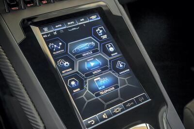 The car's touchscreen in the centre console is impressive. Courtesy Lamborghini