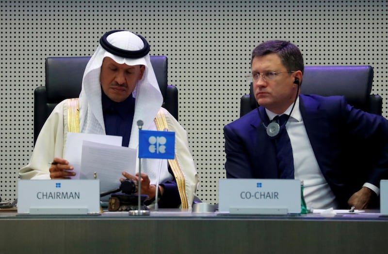 FILE PHOTO: Saudi Arabia's Minister of Energy Prince Abdulaziz bin Salman Al-Saud and Russian Energy Minister Alexander Novak at the start of an OPEC and NON-OPEC meeting in Vienna, Austria, December 6, 2019. REUTERS/Leonhard Foeger/File Photo