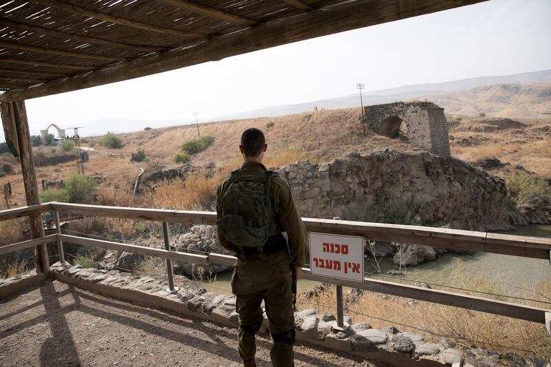 An Israeli soldier keeps watch near Baqura area, northern Jordan valley, Israel. King Abdullah II of Jordan said on 21 October that his country would not renew part of its peace agreement with Israel. EPA