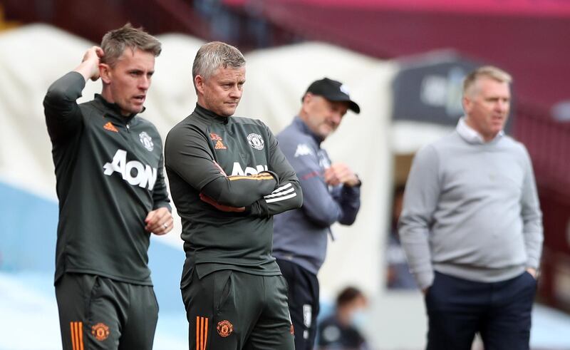 United manager Ole Gunnar Solskjaer, second left, with his Villa counterpart Dean Smith in the background. Reuters