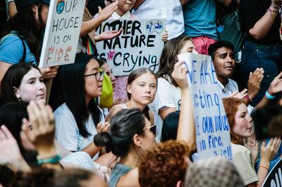 epa07804974 Young activists including Swedish activist Greta Thunberg (C) participate in a climate strike outside the United Nations in New York, New York, USA, 30 August 2019. Greta will participate in the upcoming United Nations Climate Action Summit in September. Her protests on Fridays, known as Fridays for Future', demanding action on climate change have inspired people in over 100 cities across the world.  EPA/ALBA VIGARAY