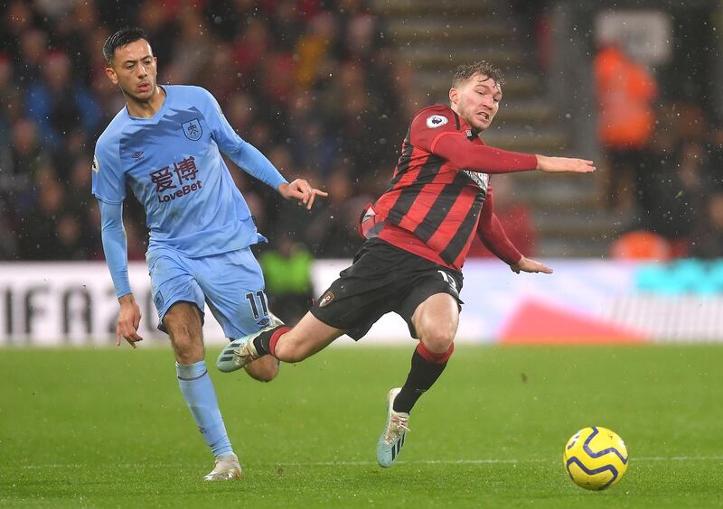 BOURNEMOUTH, ENGLAND - DECEMBER 21: Dwight McNeil of Burnley battles for possession with Jack Stacey of AFC Bournemouth during the Premier League match between AFC Bournemouth and Burnley FC at Vitality Stadium on December 21, 2019 in Bournemouth, United Kingdom. (Photo by Justin Setterfield/Getty Images)