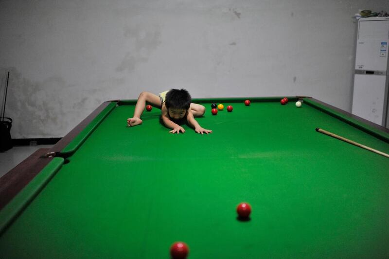 As he works on his vision of the table, Wuka often looks like a gymnast or a yoga artist. Reuters