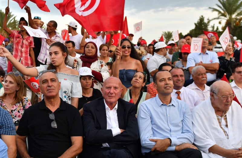 Supporters of former Tunisian defence minister and presidential candidate Abdelkrim Zbidi (not pictured) gather during his presidential campagne tour in the central coast city of Monastir. Campaigning for Tunisia's presidential election opened on September 2 with 26 candidates vying to replace late leader Beji Caid Essebsi in a vote seen as vital to defending democratic gains in the cradle of the Arab Spring.  AFP