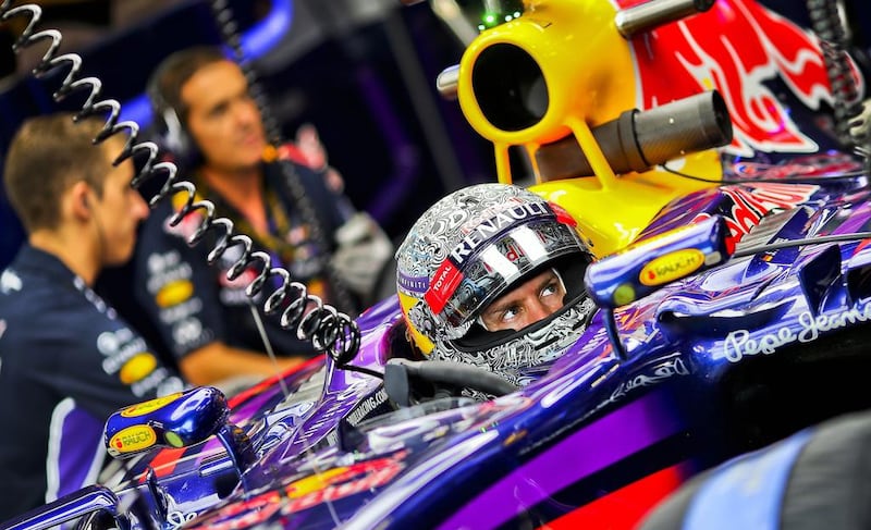 Sebastian Vettel of Red Bull Racing waits during the first practice session at the Formula One circuit in Monza, Italy, on September 5, 2014. Srdjan Suki / EPA