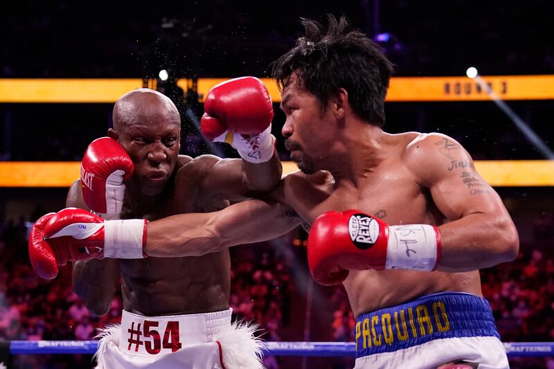 Manny Pacquiao in action against Yordenis Ugas. AP